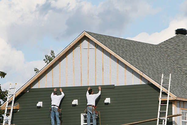 Professional Siding technician working in Hebron, MD